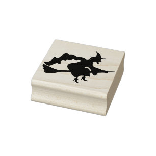 Een heks met een bordje van 2 silhouette rubberstempel