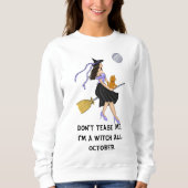 Een heks met een Oranje kat op een Broomstick Trui (Voorkant)