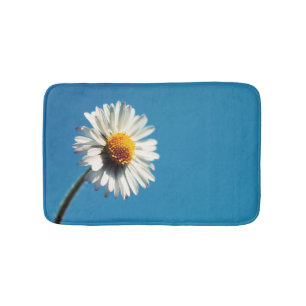 Een heldere Witte Daisy onder een Big Blue Sky Badmat
