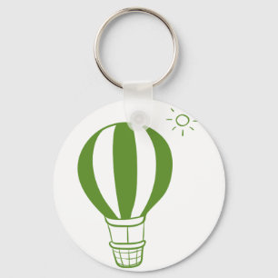 Een hete luchtballon en een zon sleutelhanger