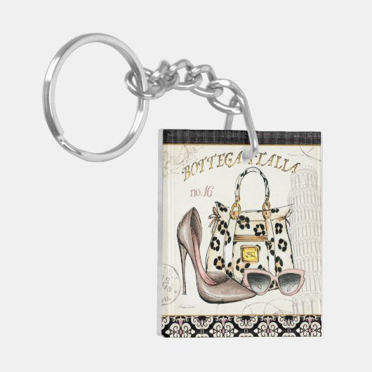 Een hoefijzer, een tas en een paar bril sleutelhanger (Voorkant Links)