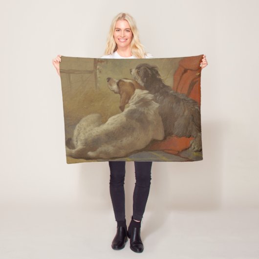 Een hond en een gekaarde jongen (twee honden) (die fleece deken (In situ)