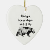 Een honingbadger, een soort dag keramisch ornament (Rechts)