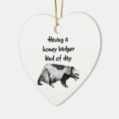 Een honingbadger, een soort dag keramisch ornament (Links)