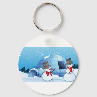 een igloo en sneeuwpoppen sleutelhanger