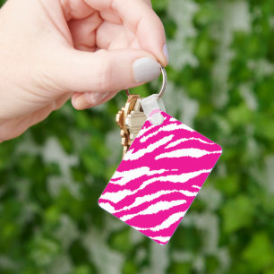 Een ingewikkeld bloemmotief in roze en wit, art sleutelhanger