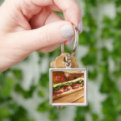 Een Italiaanse sub-sandwich met 2 Sleutelhanger (Hand)