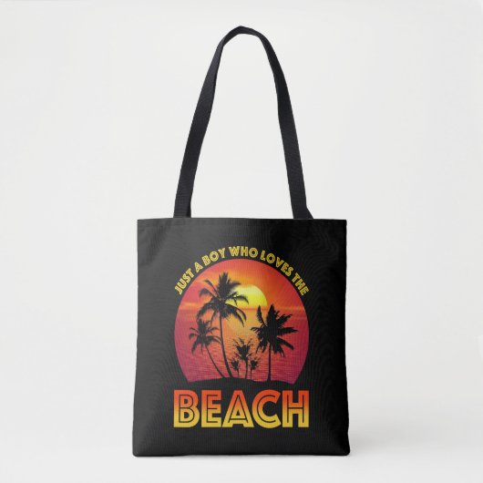 Een jongen die van het strand houdt tote bag (Voorkant)