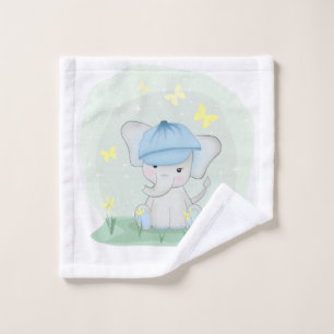 Een jute olifant in een bloemweide. washandje
