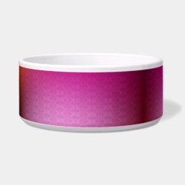 Een keramische kom met een levendig roze en rode 
