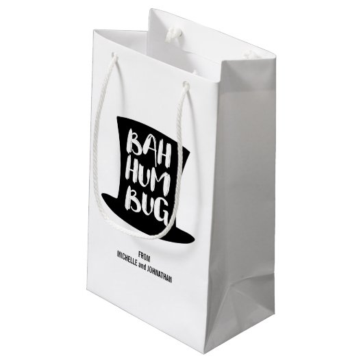 Een kerstcadeautas met cadeautjes voor kerstcadeau klein cadeauzakje (Achterkant Gekanteld)