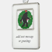 Een kerstvierkant met een adem verzilverd omlijst ornament (Links)