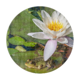 Een kikker onder een waterlelie bloem snijplank