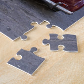 Een klassieke rode Peugeot-auto geparkeerd op stra Legpuzzel (Zijkant)