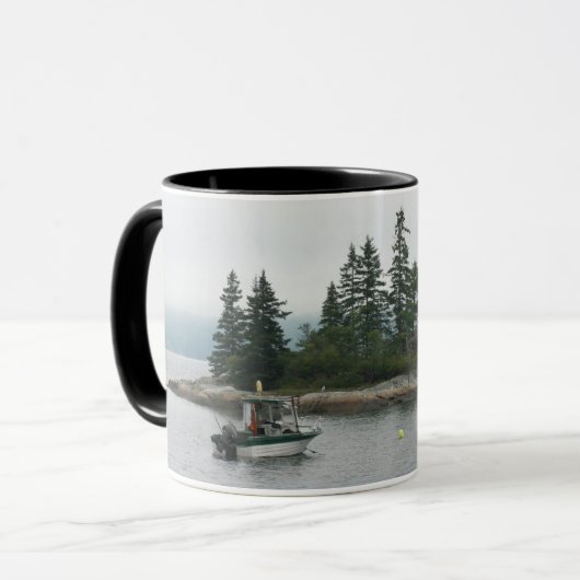 Een klein klein eiland, Mok (Voorkant links)