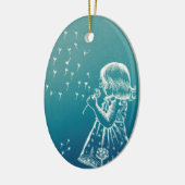 Een klein meisje dat op een dandelion blaast keramisch ornament (Links)