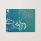 Een klein meisje dat op een dandelion blaast legpuzzel (Horizontaal)