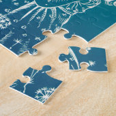 Een klein meisje dat op een dandelion blaast legpuzzel (Zijkant)