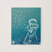 Een klein meisje dat op een dandelion blaast legpuzzel (Verticaal)