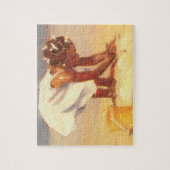 Een klein meisje dat zand speelt legpuzzel (Verticaal)