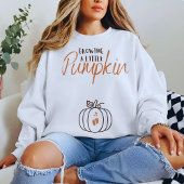Een klein pompoen sweatshirt laten groeien