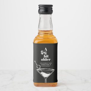 Een kleine beetje oudere moderne zwarte Martini ve Likeurfles Etiket