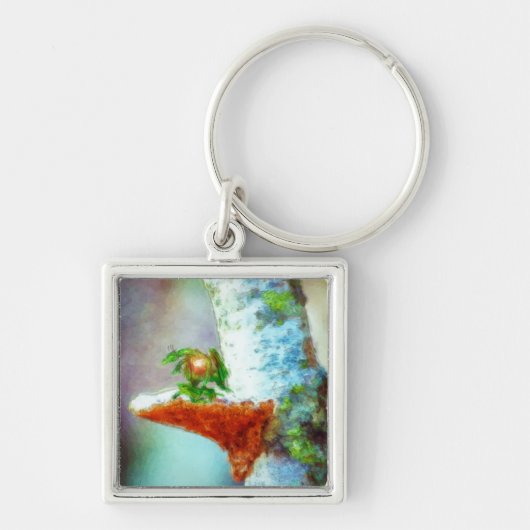 Een kleine drakenslaapstand sleutelhanger (Voorkant)