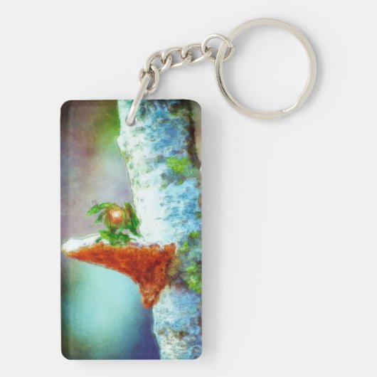 Een kleine drakenslaapstand sleutelhanger (achterkant)