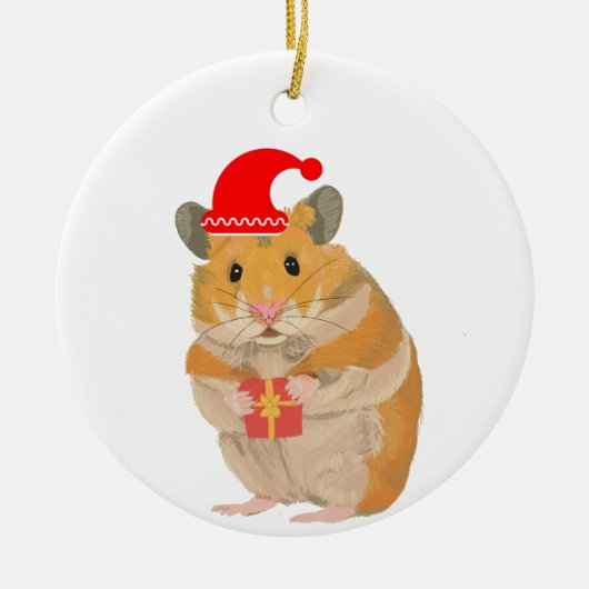 Een kleine kersthamster met een cadeau keramisch ornament (Voorkant)
