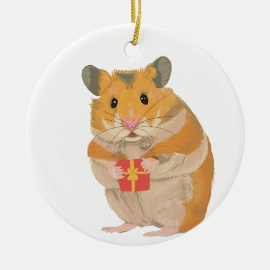 Een kleine kersthamster met een cadeau keramisch ornament (Voorkant)
