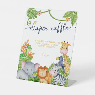 Een kleine wilde dierentuin met een luierspoelbed reclamebord met voetstuk