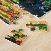 Een kleurrijke kat die tegen zonlicht op de muur l legpuzzel (Zijkant)