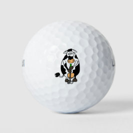 Een koe die golft golfballen