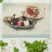 Een kopje thee en snoepjes met citaat theedoek (Gevouwen)