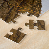 Een kotelaar op een filiaal legpuzzel (Zijkant)