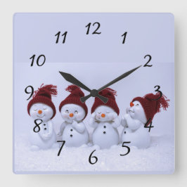 Een kwartet sneeuwpoppen vierkante klok