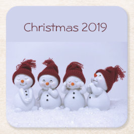 Een kwartet van sneeuwmannen kartonnen onderzetters