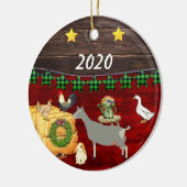 Een landelijk kersttoggenburggeit keramisch ornament (Links)