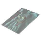 Een laptop met Wild- en Stormy-Zee Notitieblok (Schuin)