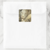 Een leeuw die de voet van Daniel likt Vierkante Sticker (Tas)