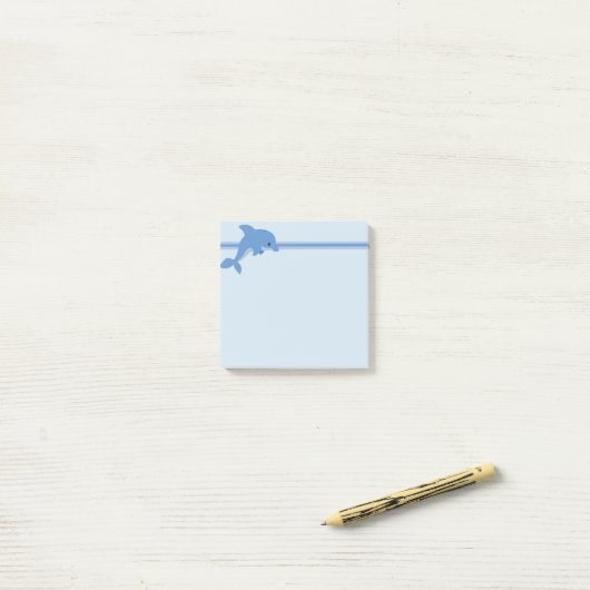Een leuke Gelukkige Dolfijn Post-it® Notes (Op bureau)