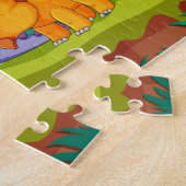 Een leuke illustratie van dinosaurussen in een oer legpuzzel (Zijkant)