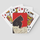 Een leuke kattenpoot poetst roodzwart pokerkaarten (Achterkant)