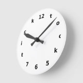 een leuke tikkertje ronde klok (Hoek)