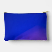 Een levendig blauwe ritssluitingstas met een subti etui (Achterkant)