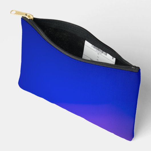 Een levendig blauwe ritssluitingstas met een subti etui (Open)