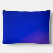 Een levendig blauwe ritssluitingstas met een subti etui (Voorkant)
