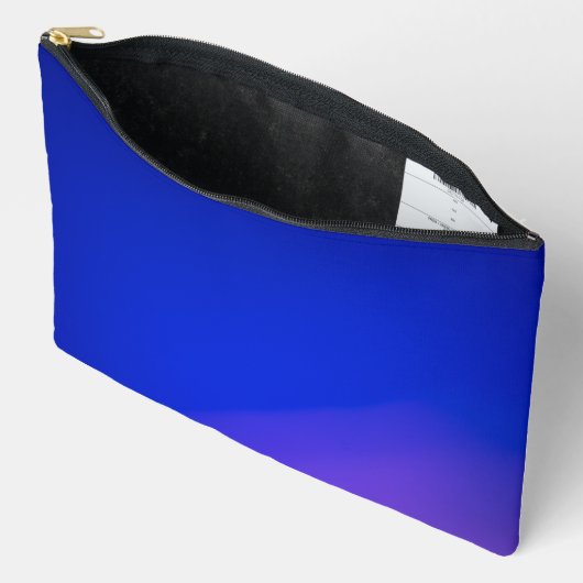 Een levendig blauwe ritssluitingstas met een subti etui (Open)