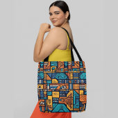 Een levendig en abstract geometrisch patroon tote bag