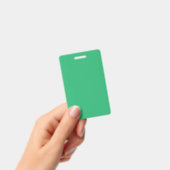 Een levendig groen blad met prominente aderen en e badge (Handheld)